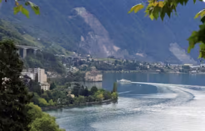 cgn boat approaching chateau de chillon castle near montreux