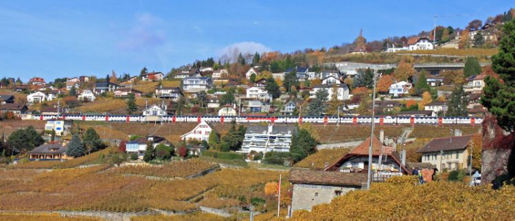 Swiss Train Passing through Grandvaux on Lake Geneva, Switzerland