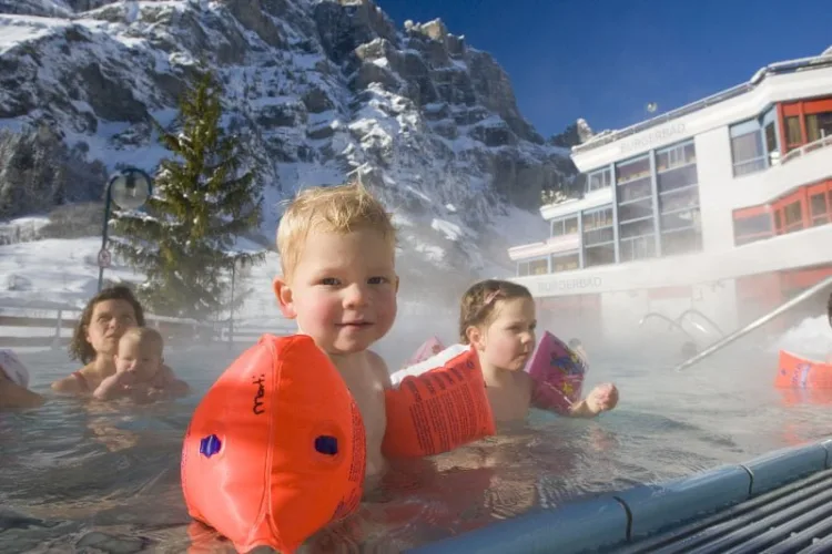 Families in Leukerbad Therme (Burgerbad) in Loeche les Bains