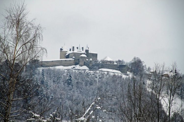 Snow-Covered Chateau de Gruyères in Fribourg, Switzerland