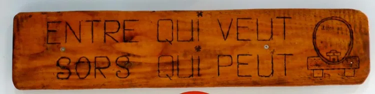 Sign in a wine cellar in Luins