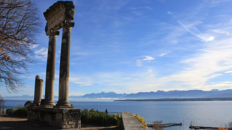Roman pillar in Nyon with view of Lake Geneva