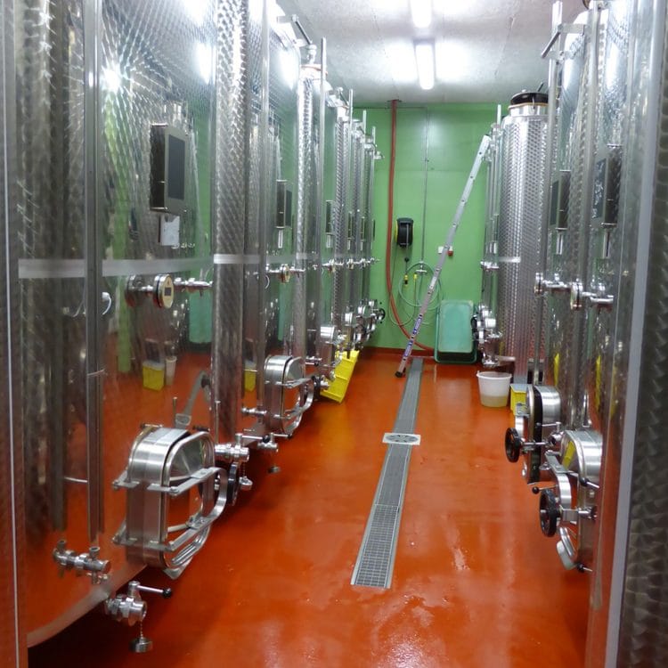 Stainless steel wine tanks and Modern Wine production technology at Swiss cellars in the Lake Geneva region