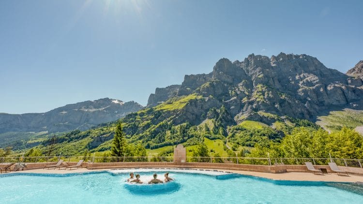 Walliser Alpentherme Summer Outdoor Pool with Jacuzzi and views of the Alps