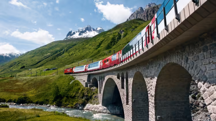 The Glacier Express near Hospental in the Urseren valley, Canton Uri, Central Switzerland.